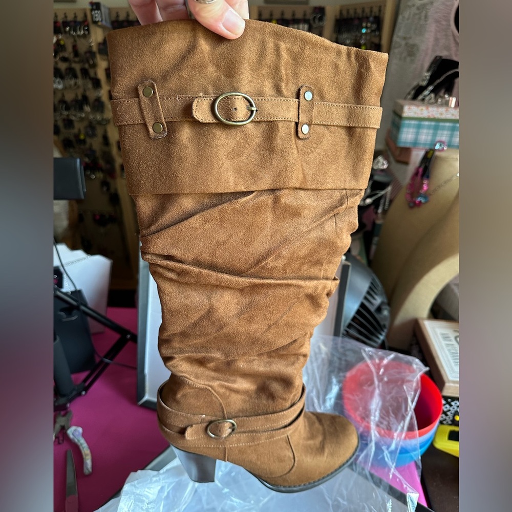 Sued tobacco colored knee high boots. Pristine condition.